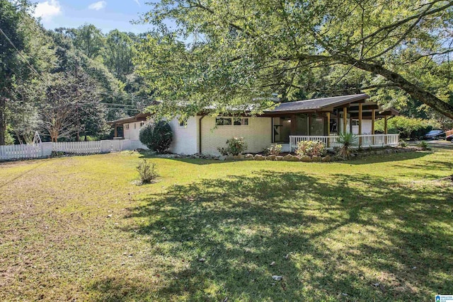 view of yard featuring a porch