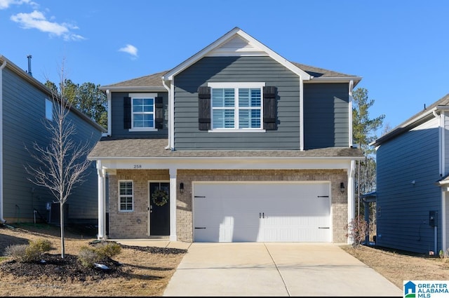 front of property with a garage