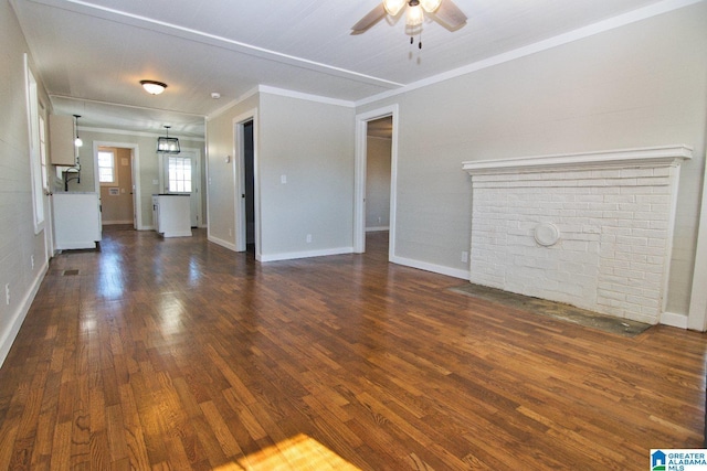 unfurnished living room with dark wood-type flooring, ceiling fan, and ornamental molding