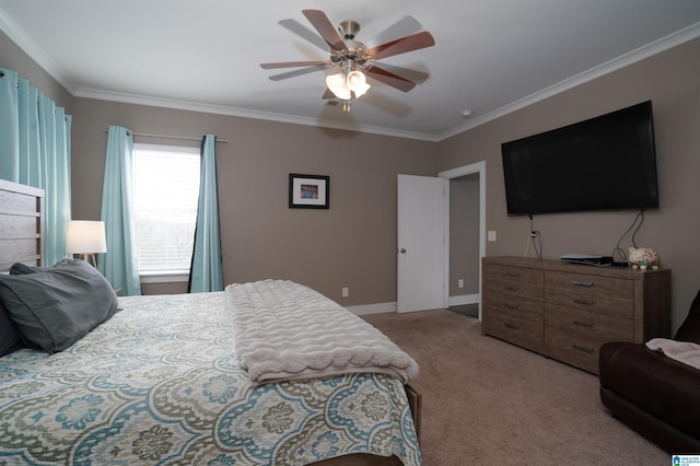 bedroom with ceiling fan, crown molding, and light carpet