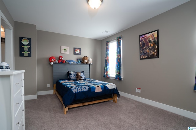 bedroom featuring carpet