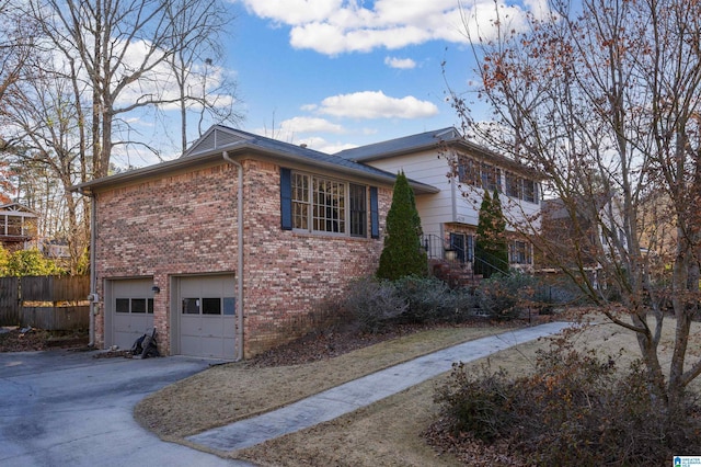 view of side of property featuring a garage