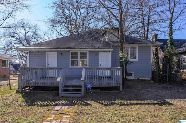 view of front of property featuring a wooden deck