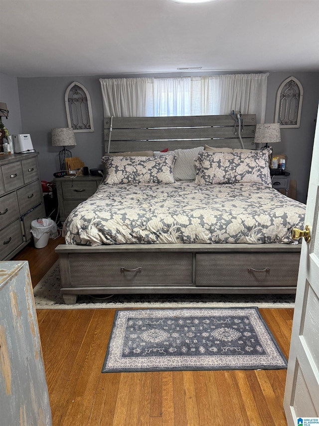 bedroom featuring light wood finished floors