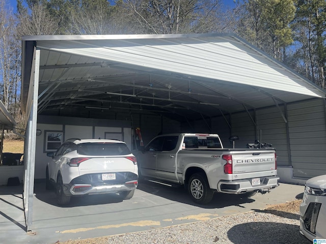 view of parking / parking lot featuring a carport