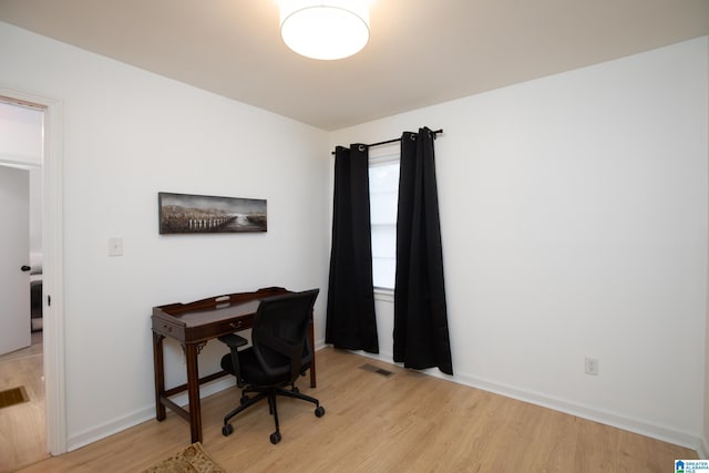 office space featuring light wood-type flooring