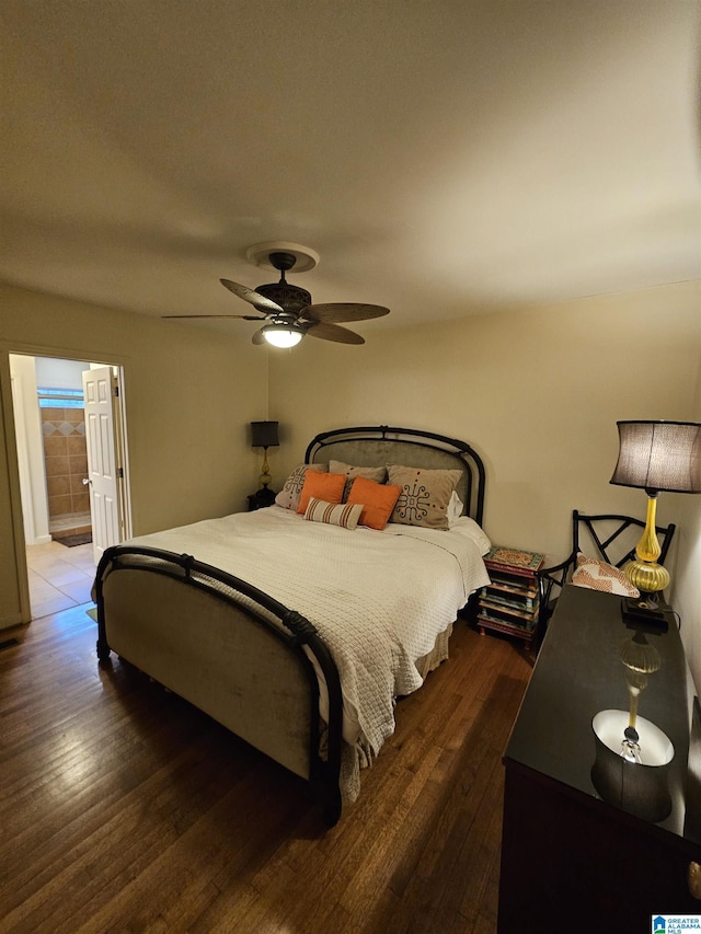 bedroom featuring dark hardwood / wood-style floors and ceiling fan