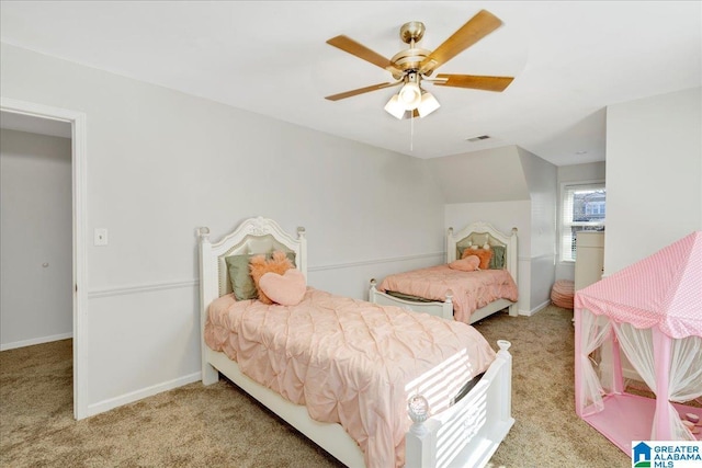 bedroom with ceiling fan, lofted ceiling, and light colored carpet