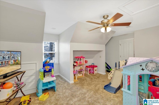 playroom featuring light carpet, ceiling fan, and lofted ceiling