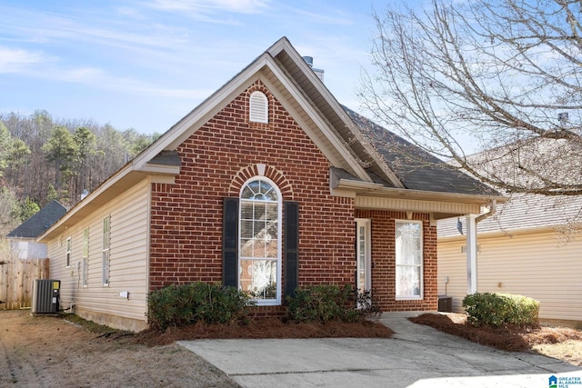 view of front of house featuring cooling unit