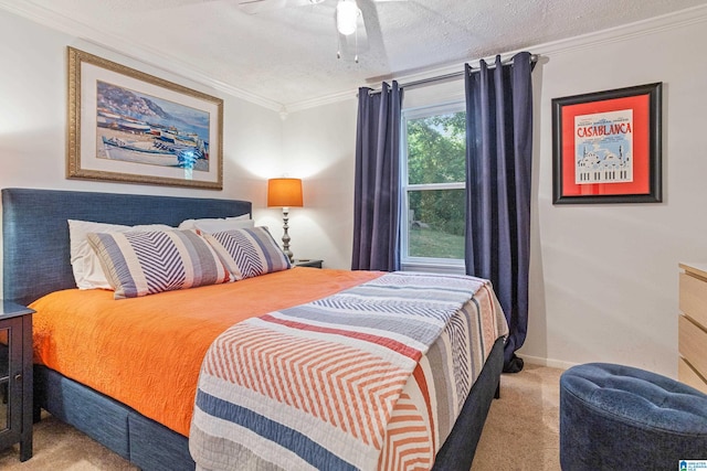 bedroom featuring carpet, ceiling fan, crown molding, and a textured ceiling