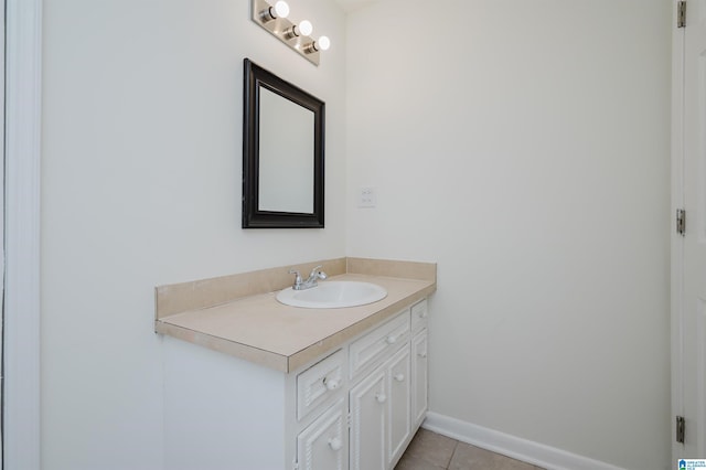 bathroom with vanity and tile patterned flooring