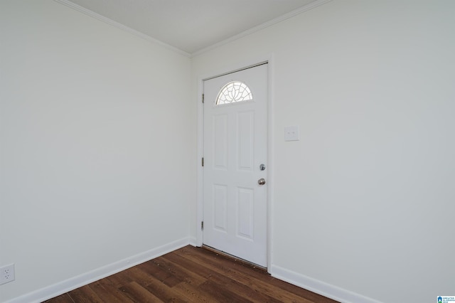 foyer featuring dark wood-type flooring and ornamental molding