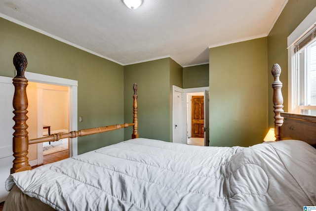 bedroom with crown molding