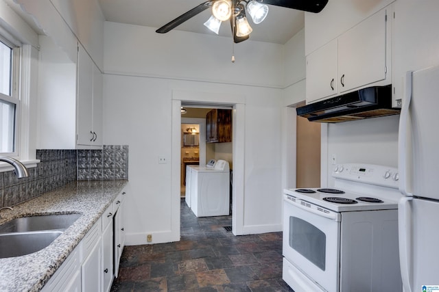 kitchen featuring sink, white cabinets, white appliances, light stone countertops, and backsplash