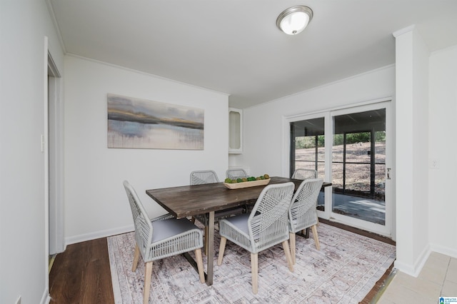 dining space featuring light hardwood / wood-style flooring