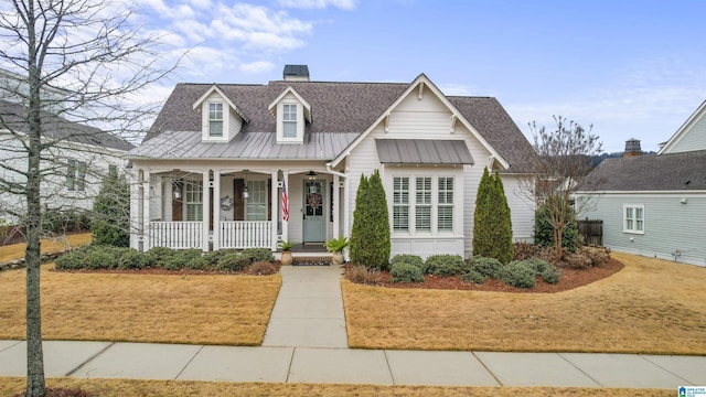 view of front of property featuring covered porch