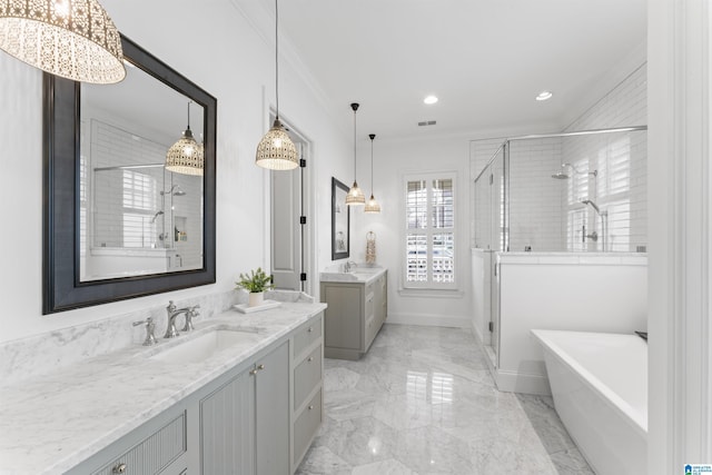 bathroom with vanity, separate shower and tub, and ornamental molding