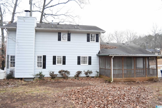 back of property featuring a sunroom