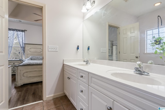 bathroom featuring tile patterned floors and vanity