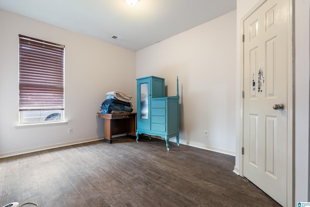 bedroom featuring dark hardwood / wood-style floors