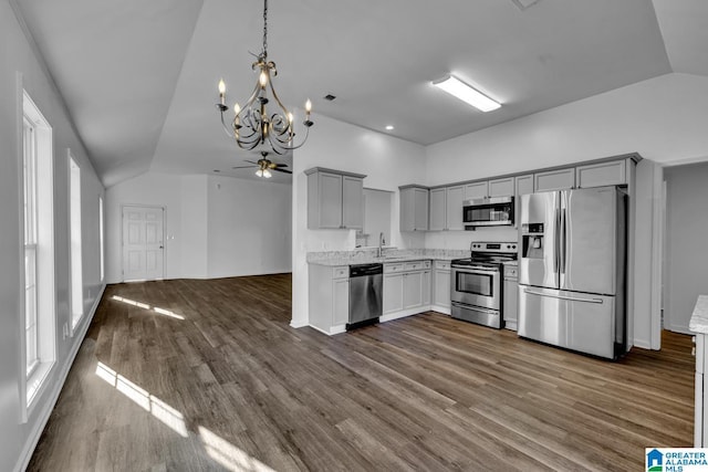 kitchen featuring sink, a wealth of natural light, dark hardwood / wood-style flooring, and stainless steel appliances