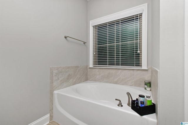 bathroom featuring a tub