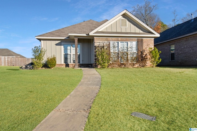 view of front of home with a front lawn