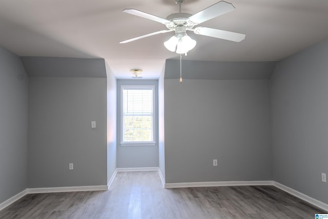 bonus room featuring vaulted ceiling, ceiling fan, and hardwood / wood-style floors