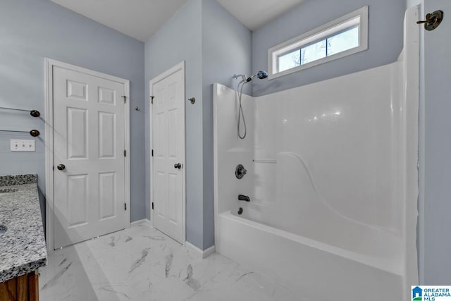 bathroom featuring vanity and shower / bathing tub combination