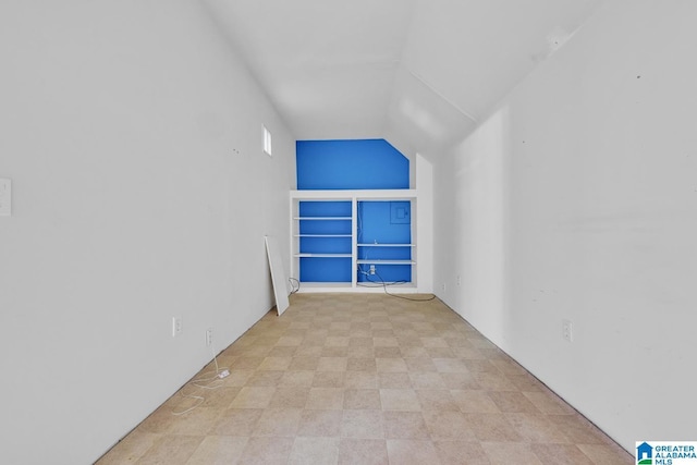 bonus room featuring lofted ceiling