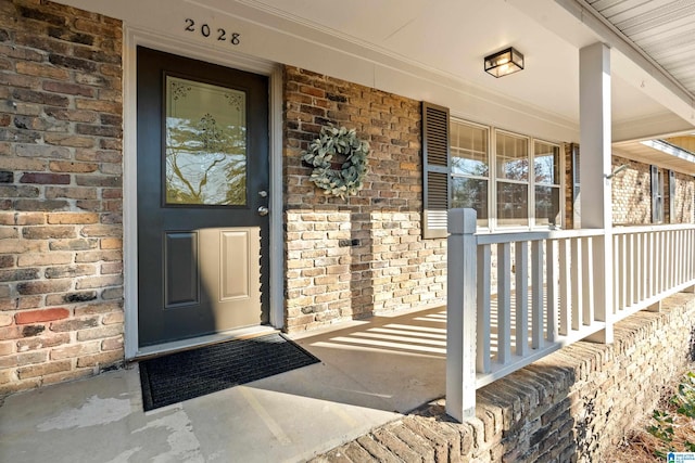 entrance to property with a porch