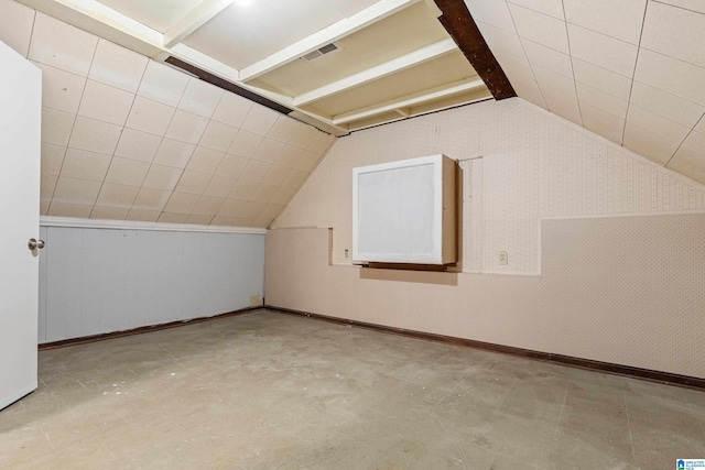 additional living space with vaulted ceiling