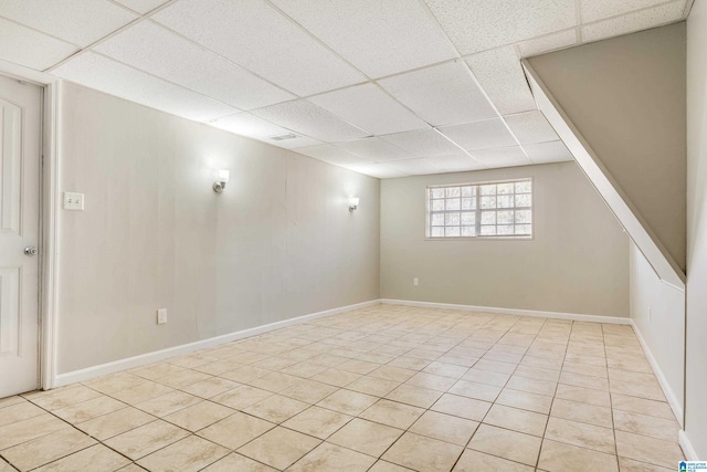 spare room featuring light tile patterned floors