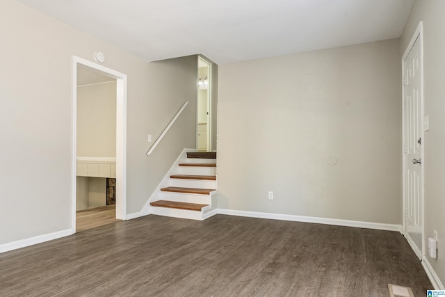 interior space with dark wood-type flooring