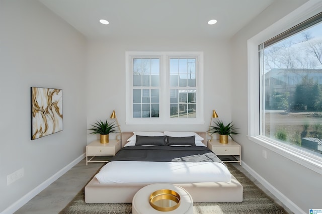 bedroom with wood-type flooring