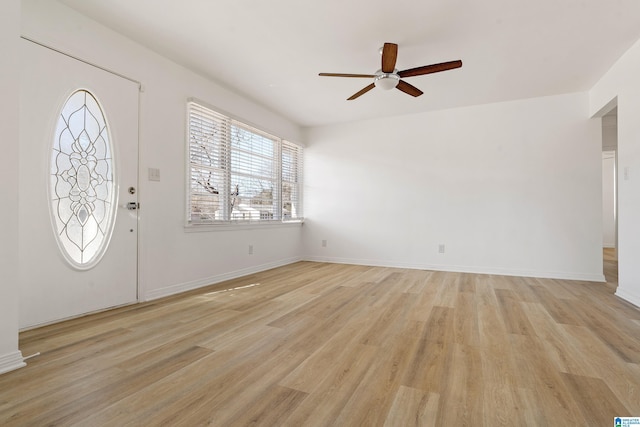 entrance foyer featuring ceiling fan and light hardwood / wood-style flooring