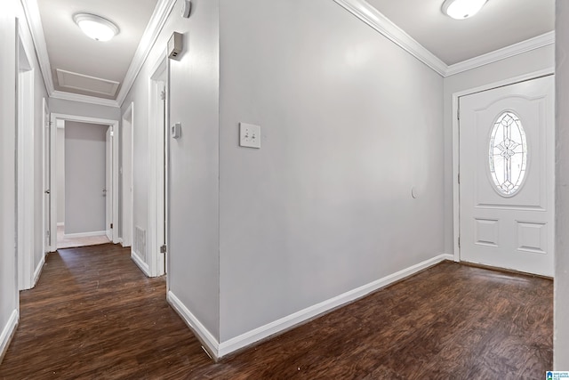 entrance foyer with crown molding and dark hardwood / wood-style floors