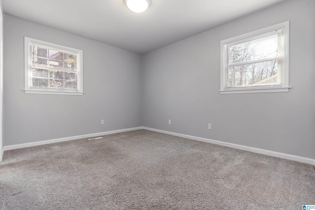 view of carpeted spare room