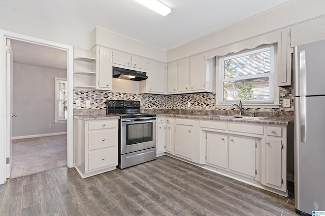 kitchen with light hardwood / wood-style floors, sink, white cabinetry, and appliances with stainless steel finishes