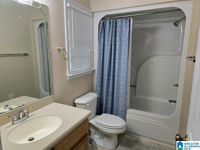 full bathroom featuring toilet, vanity, and shower / tub combo