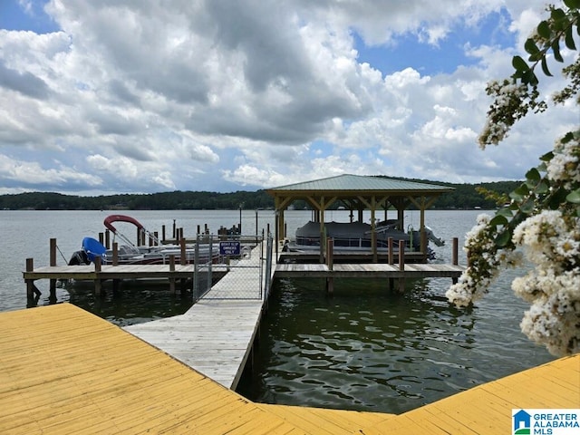 view of dock with a water view