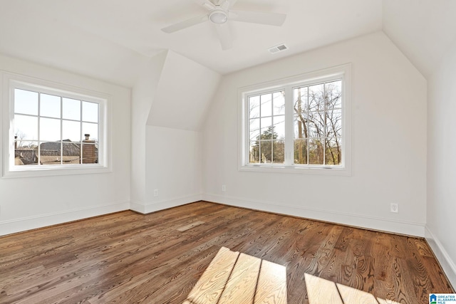 bonus room featuring ceiling fan, lofted ceiling, and hardwood / wood-style floors