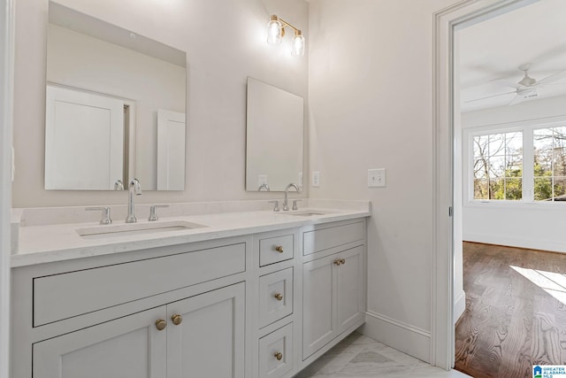 bathroom with vanity and ceiling fan