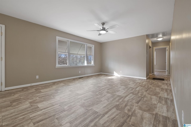 empty room featuring ceiling fan