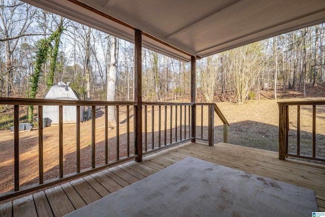 deck with a storage shed