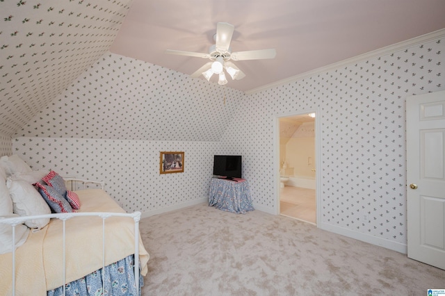 carpeted bedroom featuring ceiling fan, connected bathroom, and crown molding