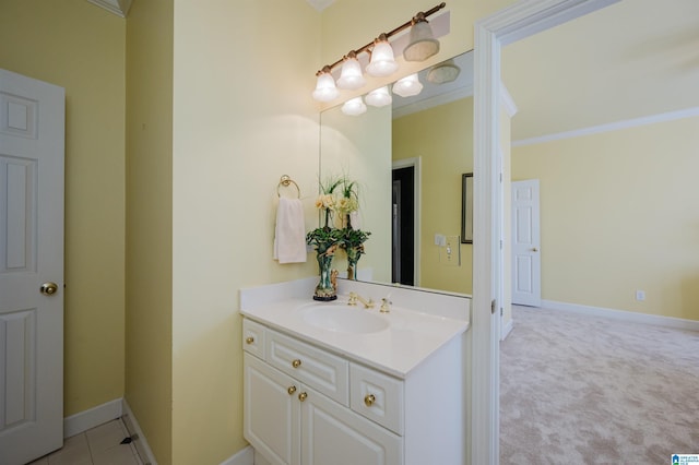 bathroom featuring vanity and ornamental molding