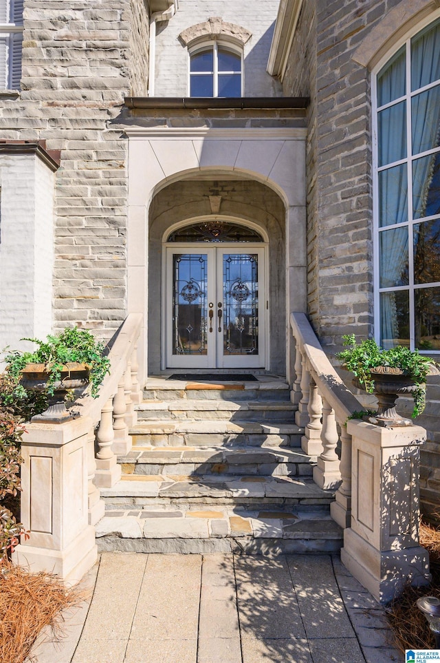 entrance to property featuring french doors