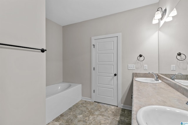 bathroom with vanity and a bathing tub